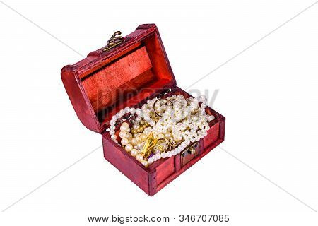 Old Box Of Red Wood Full Of Jewelry Isolated On Ehite Background. Treasure Chest