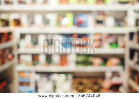 Blurred Of Kids Toy Store Background. Natural Bokeh Shopping Mall Toy Store. Kids Shop Background Wi