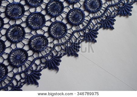 Diagonal Edge Of Navy Blue Crochet Lace