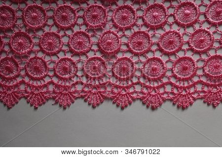 Horizontal Edge Of Bright Pink Crochet Lace