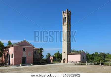 Big Bell Tower And Small Church In The Village Near Venice Called Lio Piccolo In Italy