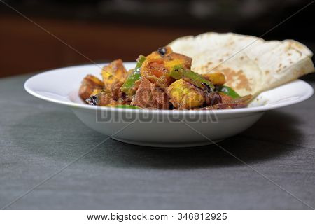 Top Down View Of Paneer Shimla Mirch Or Paneer Capsicum Or Tofu Capsicum On A Grey Background, Selec