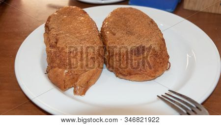 Torrija, Sugar Also Called French Toast  On The Plate