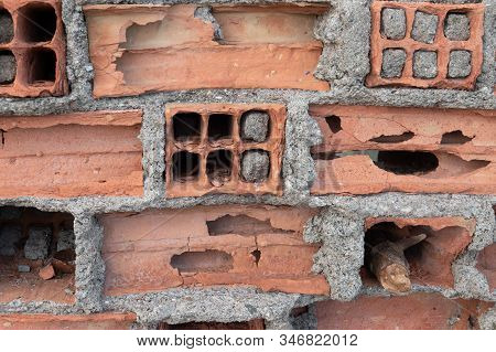 Old Brick Wall With The Destroyed Brick. The Inside Of The Brick