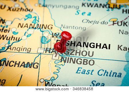 Prague, Czech Republic - January 12, 2019: Red Thumbtack In A Map. Pushpin Pointing At Ningbo City I