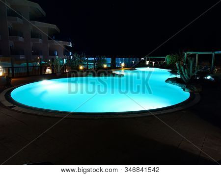 Sweeming Pool With Blue Light. Summer Night In Hugharda City, Egypt