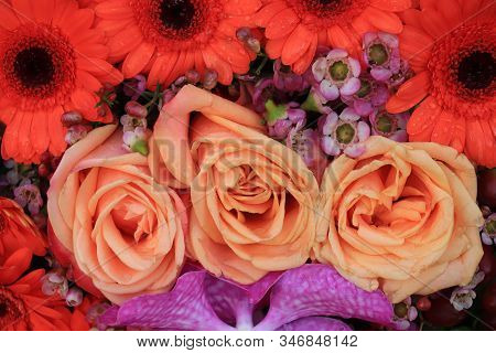 Pink And Orangeflowers In A Big Wedding Centerpiece, Roses And Gerberas