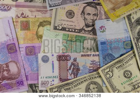 Multicurrency Background Of The Us Dollars, Russian Rubles And Ukrainian Hryvnias