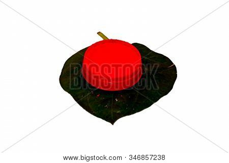 Sindoor Or Sindur, Vermilion Powder Pot On Betel Leaf.