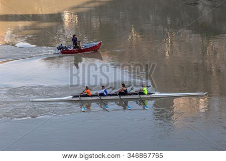 Rome, Italy - December 06, 2019:  Group Of People Training On Kayak. Sightseeing Boat Floating Near 