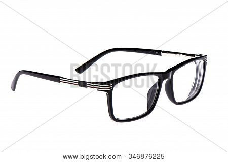 Glasses In A Black Plastic Frame Isolated On A White Background. Glasses With Plastic Earhooks. Copy