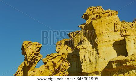 The Enchanted City Of Bolnuevo, Eroded Yellow Sandstone Shapes Formations, Mazarron Murcia Spain. To