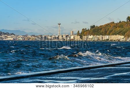 A View Of Elliott Bay With Alki Beach Condos In The Distance.