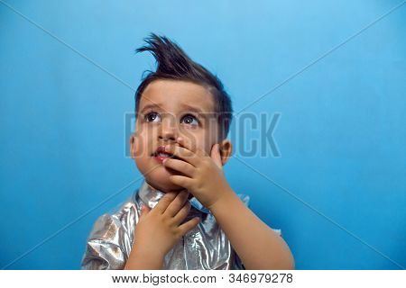 Child A Boy Of Three Years Old With A Fashionable Hairstyle