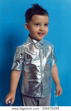 Child A Boy Of Three Years Old With A Fashionable Hairstyle