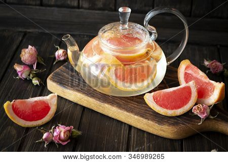 Glass Teapot With Pink Grapefruit And Roses Tea