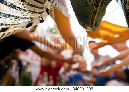 Many Childrens Hands Outstretched In A Pile. The Concept Of Childrens Games