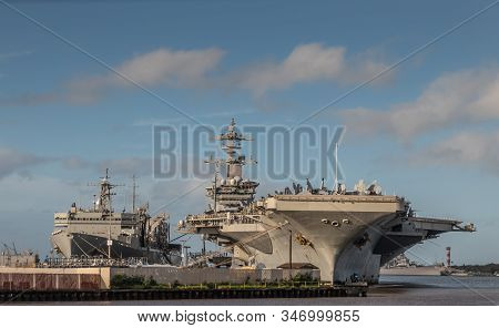 Oahu, Hawaii, Usa. - January 10, 2020: Pearl Harbor. Gray Abraham Lincoln Aircraft Carrier Docked Wi