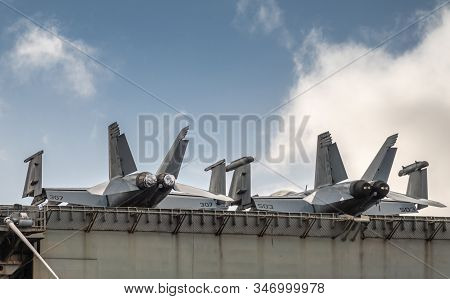 Oahu, Hawaii, Usa. - January 10, 2020: Pearl Harbor. Fighter Jets On Deck Of Gray Abraham Lincoln Ai