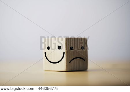 Smile Face In Bright Side And Sad Face In Dark Side On Wooden Block Cube For Positive Mindset Select