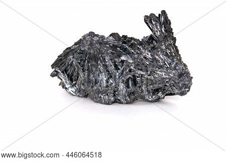 Mineral Crystals Of Natural Antimonite. Isolated On A White Background.