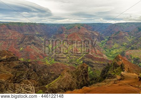 Scenic View Of Waimea Canyon And Waterfall On A Hazy Day, Kauai Island, Hawaii