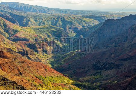 Scenic View Of Waimea Canyon And Waterfall On A Hazy Day, Kauai Island, Hawaii