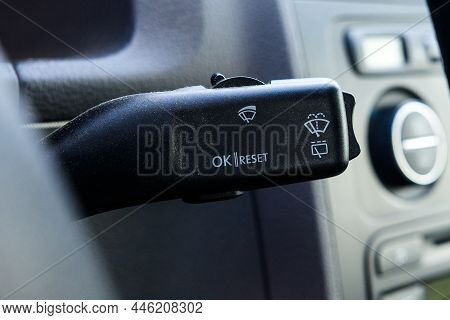 Close-up Of On-board Computer Button And Power On Wiper In Car.