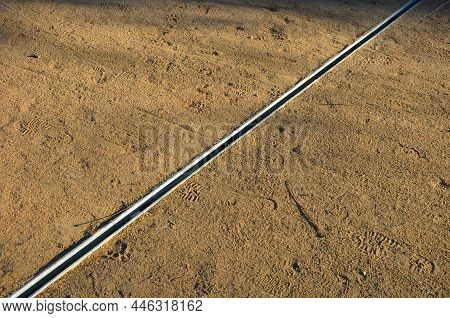 Park Square With Gravel Compacted Paths And Concrete Sidewalk. A Metal Slot Gutter Is Used For Drain