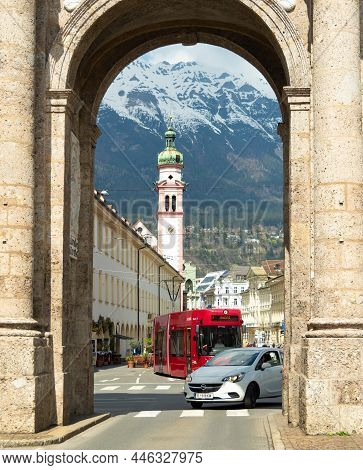 Innsbruck, Austria - April 17th 2018: View Through A Portal Into The City Centre With Traffic