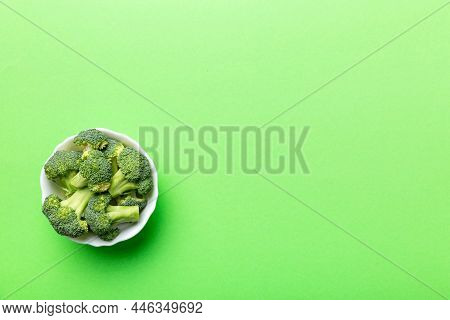 Broccoli Of Fresh Green Broccoli In Bowl Over Coloredbackground. , Close Up. Fresh Vegetable.