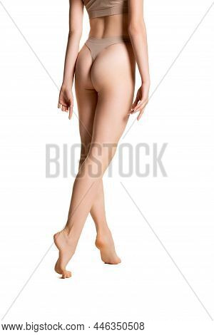 Beautiful Female Body, Slender Legs Isolated On White Studio Background. Natural Beauty, Spa, Anti-c