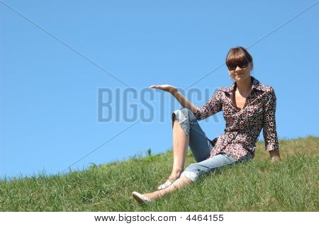 Girl Posing On The Grass
