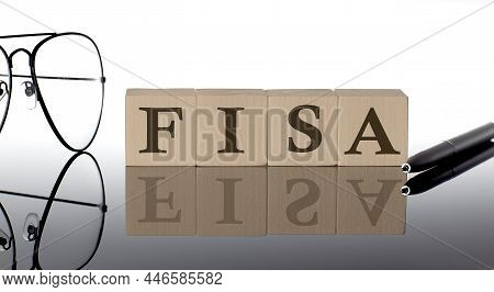 Close-up Of Fisa Wooden Blocks On Black Background With Glasses And Pen