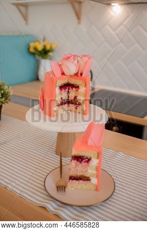 Pink Cake With Roses And Petals On A Stand , A Piece Of Cake