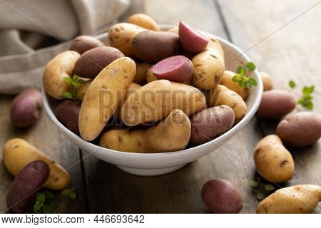 Yellow And Purple Fingerling Potatoes Ready To Be Cooked