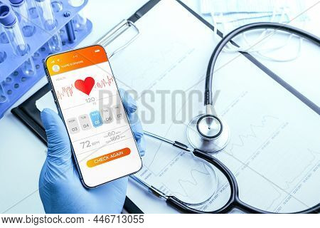 Doctor Online Medical Application. Doctor Holding Digital Smartphone. Healthcare Medicine App On Mob