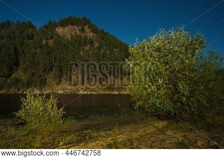 Russia. Chita Region. The Starry Sky On A Summer Full Moon Night Over The Valley Of The Menza River.