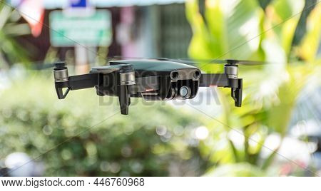 Nobody, Modern Drone With 4 Propellers Has 4k Camera Photo And Video Flying In City. The Concept For