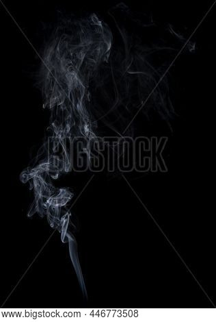 White Smoke On A Black Background. Isolated