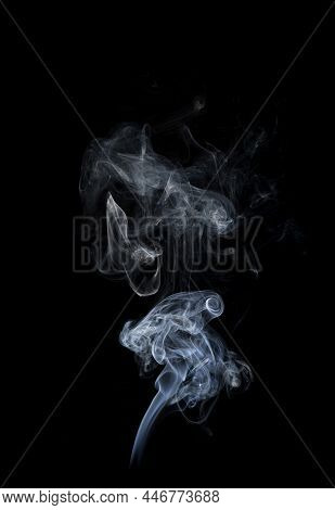 Smoke On Black Background. White Smoke On A Black Background.