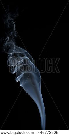 White Smoke On A Black Background. Isolated