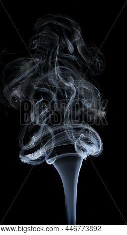 White Smoke On A Black Background. Isolated