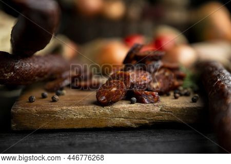Smoked, Aged Sausages With Fresh Vegetables And Food Ingrediets