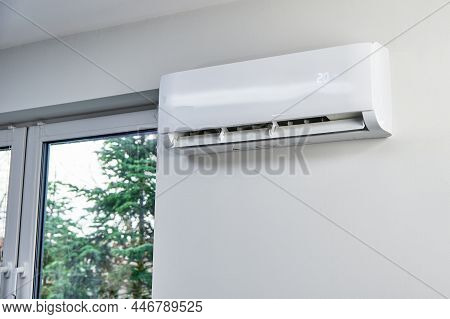 Adjusting Temperature On Air Conditioner, Working Air Conditioner For Comfort Temperature In Home At