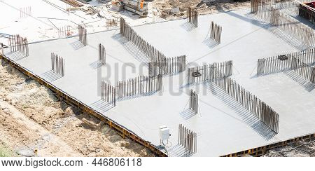 Closeup Of House Foundation Made From Concrete Shuttering Blocks Filled With Mortar And Reinforcemen