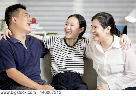Happy Parent And Teenager,father Mother And Daughter Have Fun Enjoy Free Time On Weekend,asian Famil