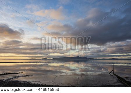 Epic Sunset Landscape Image Of Solway Firth Viewed From Silloth During Stunning Autumn Sunset With D