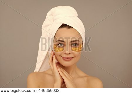 Make Them Adore. Beauty Day In Spa. Applying Golden Anti-fatigue Mask. Girl Reduce Eye Bags.