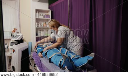 Woman Receiving Anti-cellulite Pressotherapy Lymphatic Massage Drainage Machine, Hardware Cosmetolog